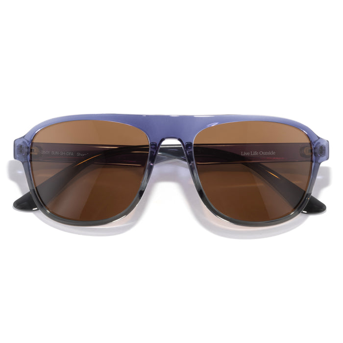 Sunglasses with brown lenses and a blue frame on a white background