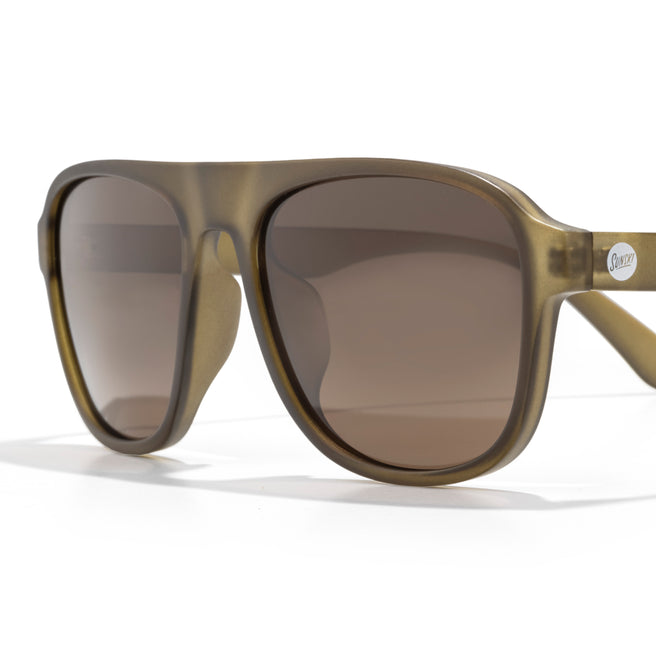 Sunglasses with brown gradient lenses on a white background