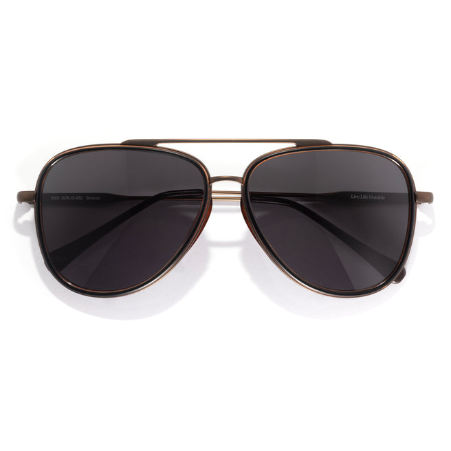 Aviator sunglasses with dark lenses on a white background