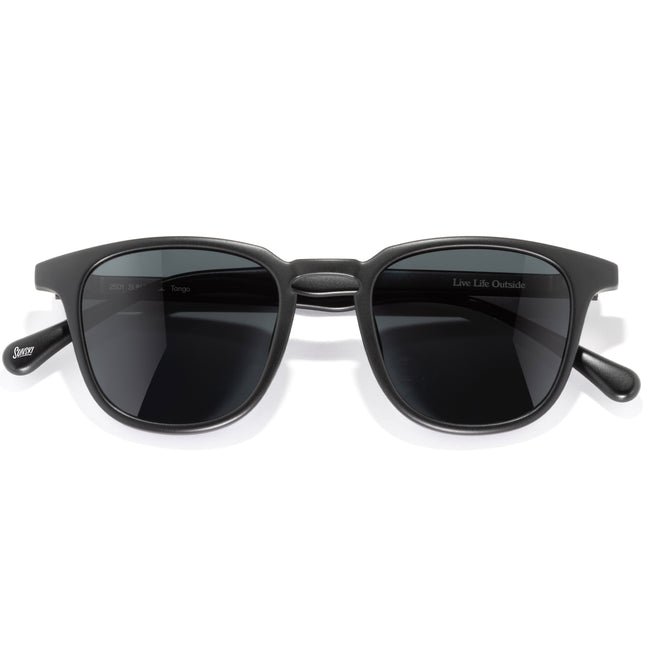 Black sunglasses with dark lenses on a white background