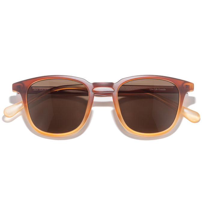 Tango - Solstice Amber - Sunglasses with brown gradient lenses and a tortoiseshell frame on a white background