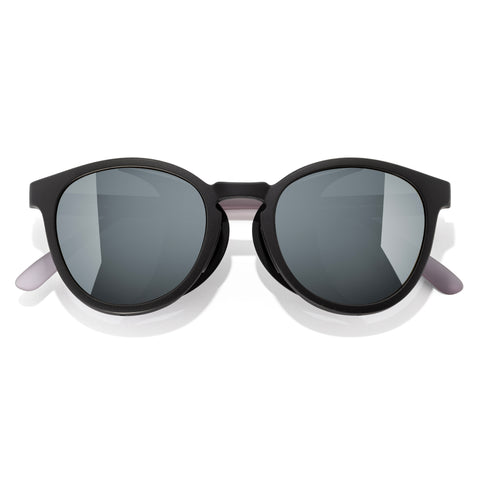 Black sunglasses with gray lenses on a white background