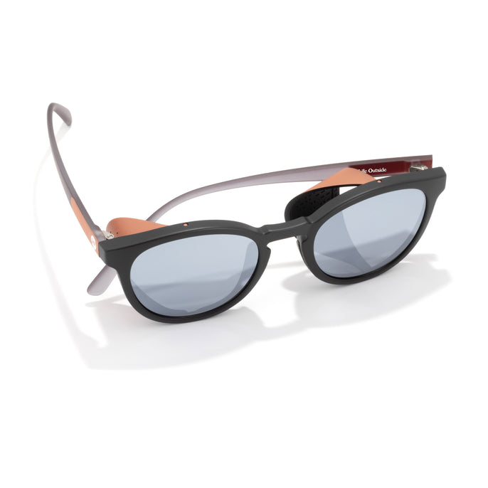 Sunglasses with black frame and reflective lenses on a white background