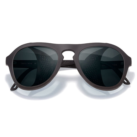 Sunglasses with dark lenses and brown frame on a white background
