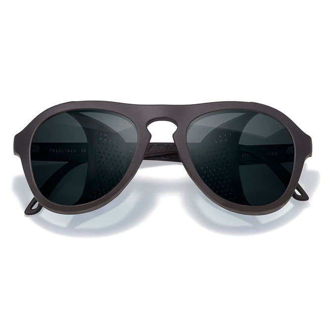 Sunglasses with dark lenses and brown frame on a white background