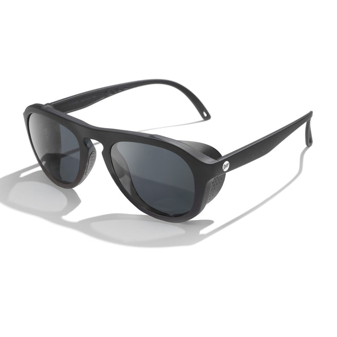 Black sunglasses with dark lenses on a white background
