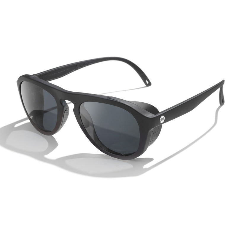 Black sunglasses with dark lenses on a white background