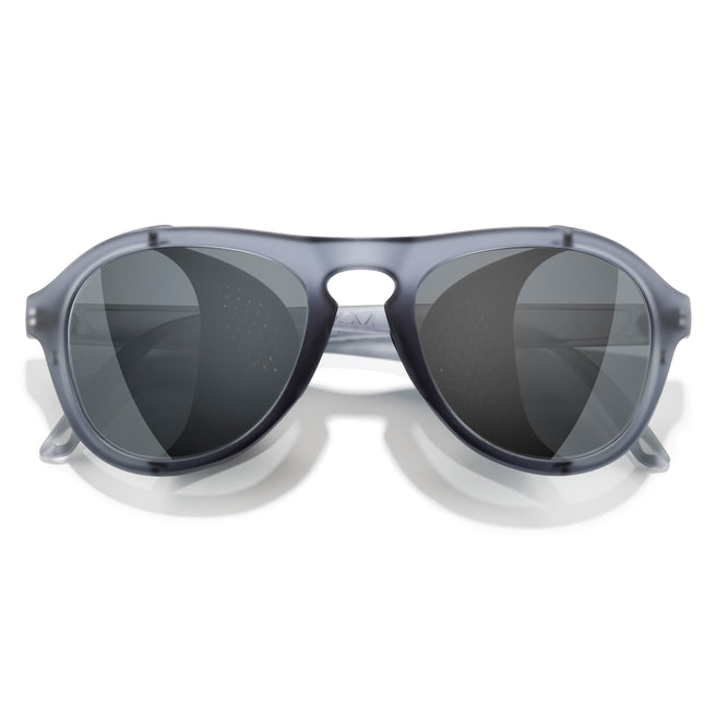Sunglasses with dark lenses on a white background