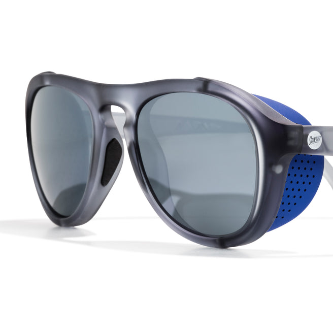 Sunglasses with a blue case on a white background