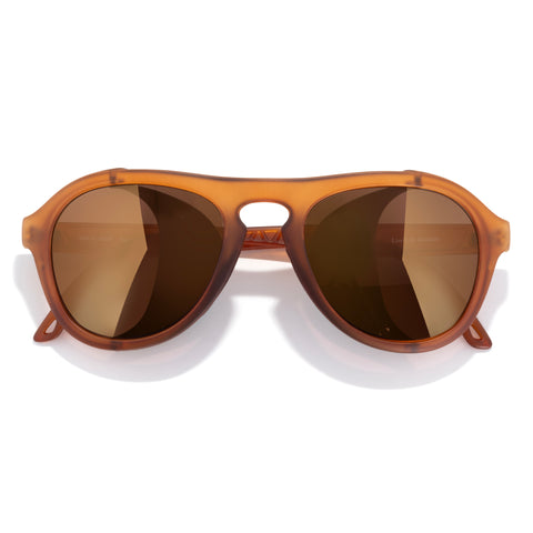 Brown sunglasses with a reflective lens on a white background
