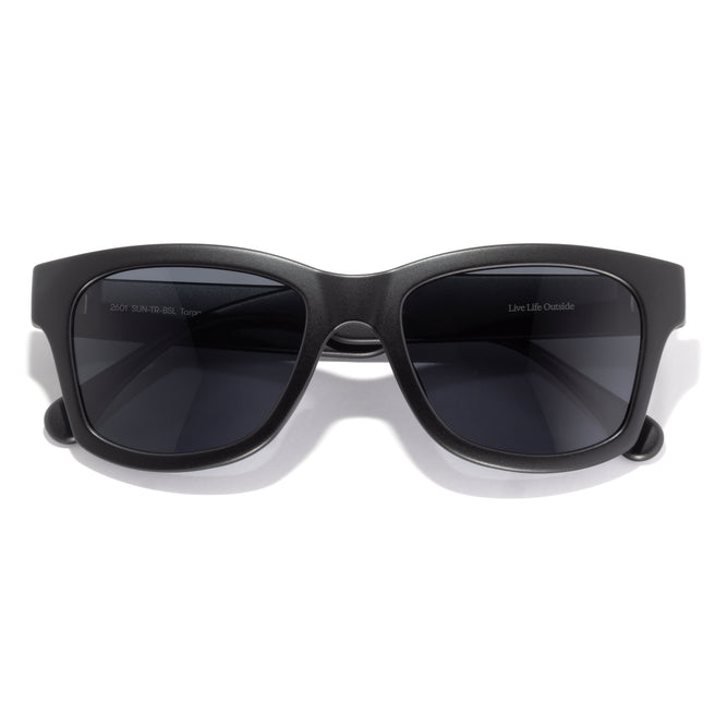 Black sunglasses with dark lenses on a white background
