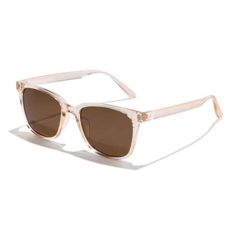 Aviator sunglasses with green lenses and black frames on a white background