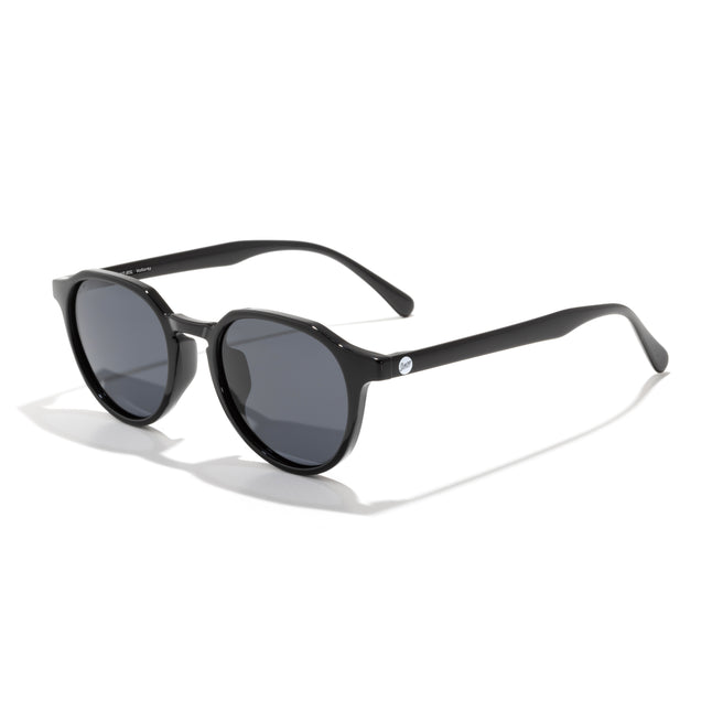 Black sunglasses with red accents on a white background