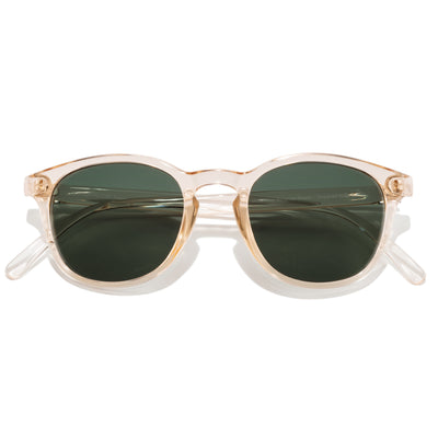 Yuba - Champagne Forest - Sunglasses with gold frame and green lenses on a white background