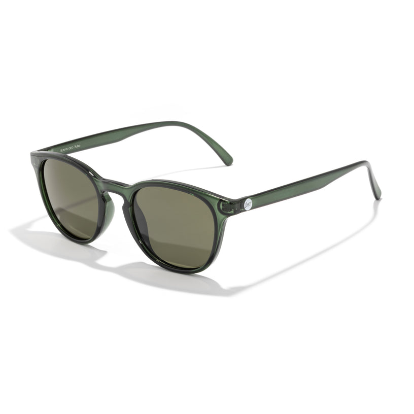 Green sunglasses with dark lenses on a white background