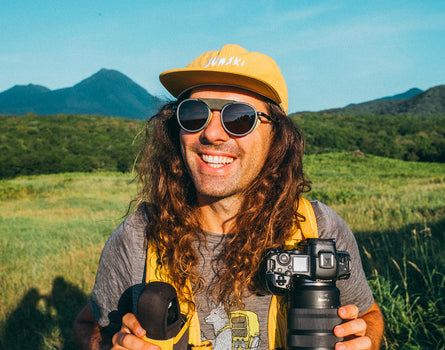 photographer in sunski strada sand amber in the mountains
