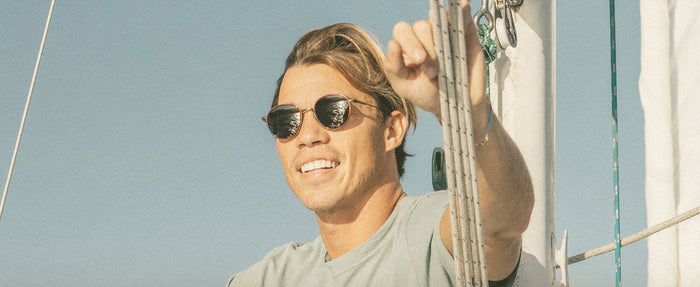man sailing in baia sunglasses