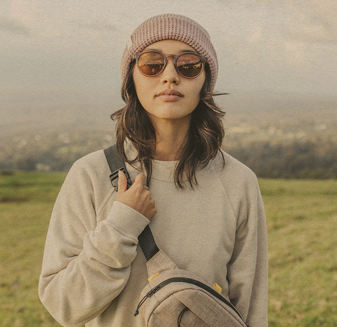 girl wearing sunski sunglasses and beanie