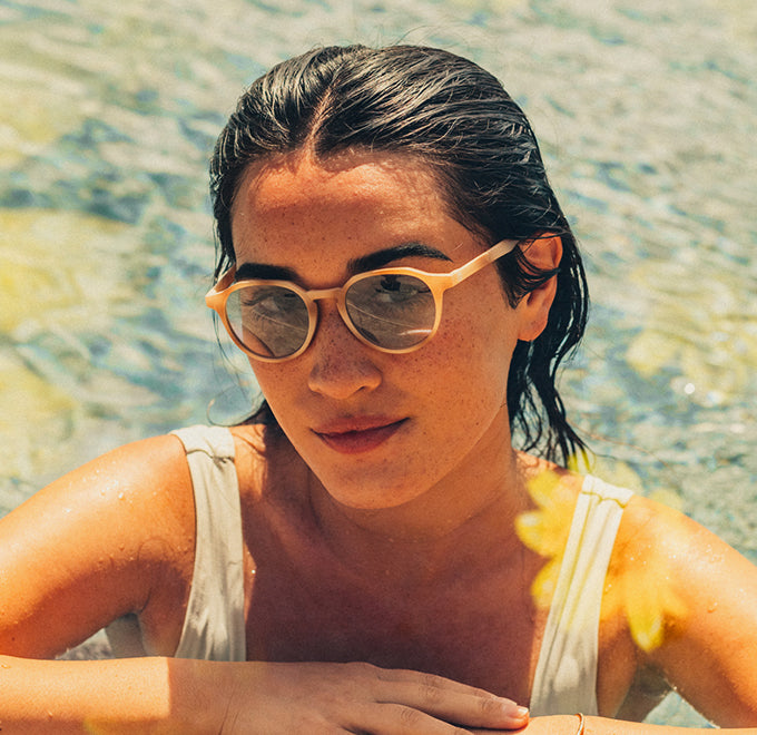 woman at the pool in sunski vallarta sunglasses