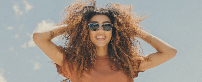 woman in sunski sunglasses