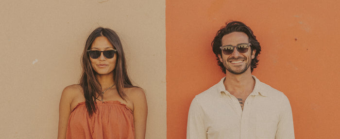 man and woman in sunski sunglasses