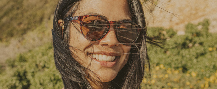 woman in sunski sunglasses