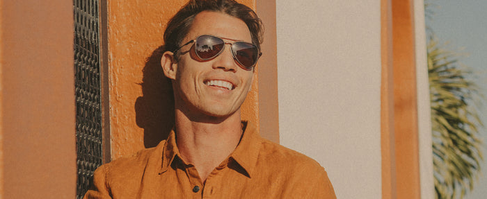 man wearing sunski premium metal sunglasses