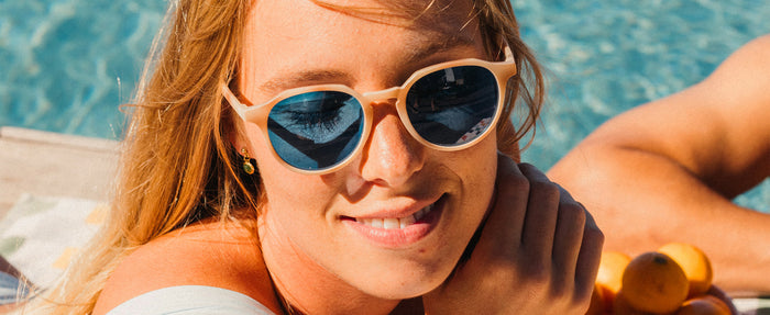 woman in vallarta sunglasses at the pool