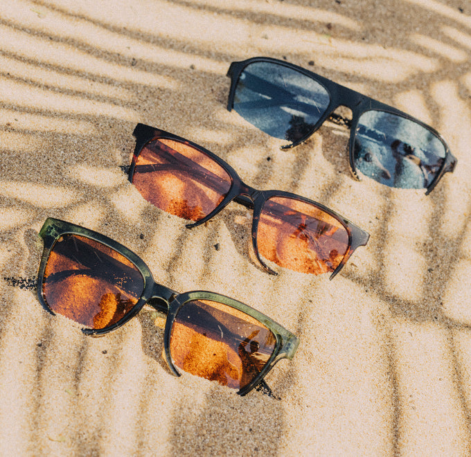 sunski tinted sunglasses in the sand