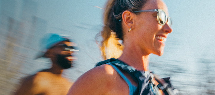 Woman running outdoors with a blurred background