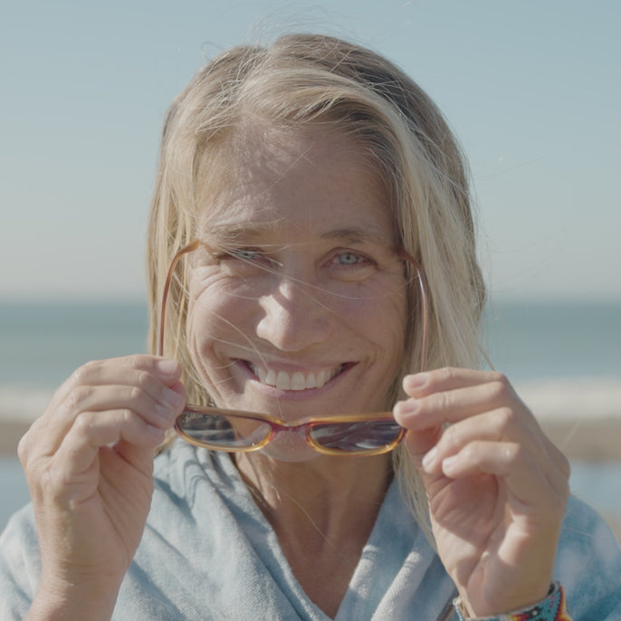 woman trying on ventana sunglasses