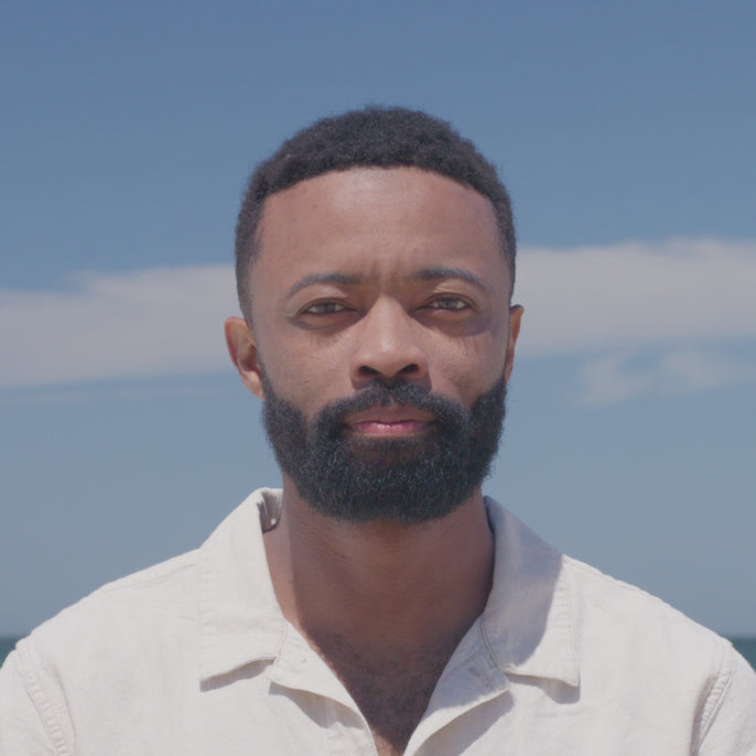 man trying on estero sunglasses