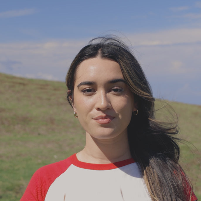 woman trying on targa sunglasses