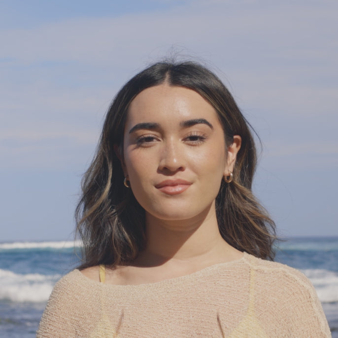 woman trying on sirocco sunski sunglasses