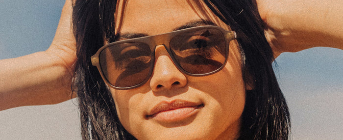 woman wearing sunski shoreline sunglasses