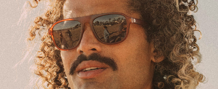 close up of man wearing sunski shoreline sunglasses