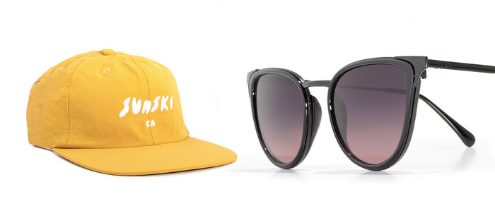 Yellow cap with 'Sunski' logo and black sunglasses on a white background