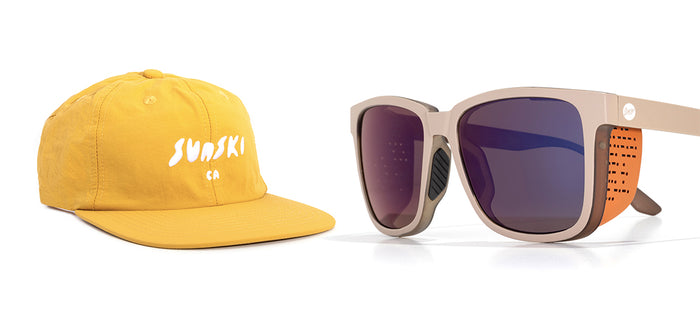 Yellow cap with 'Sunski' logo and sunglasses on a white background