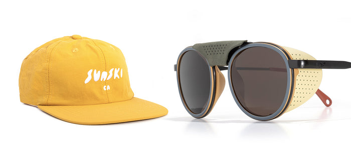 Yellow cap with 'Sunski' logo and sunglasses on a white background