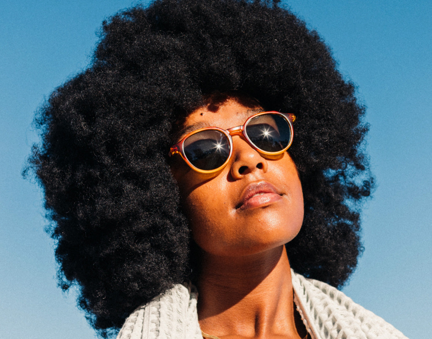girl basking wearing sunski vallarta sunglasses