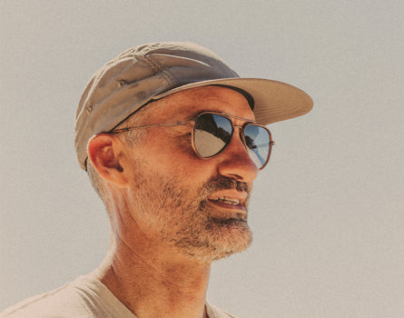 profile of man wearing sunski astra sunglasses