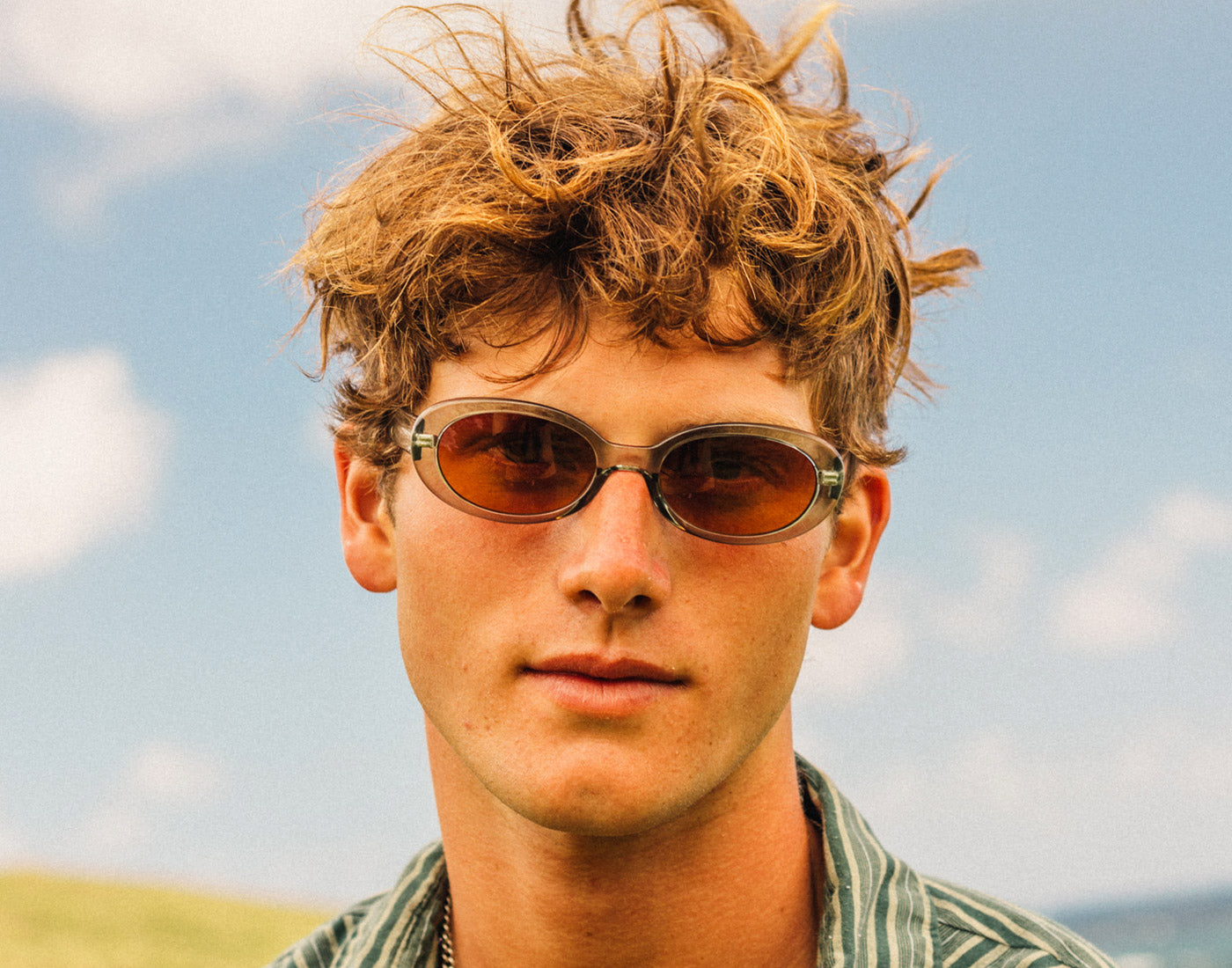 guy looking straight froward wearing sunski bianca sunglasses