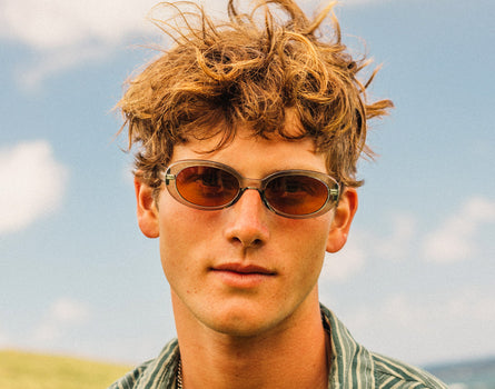 guy looking straight froward wearing sunski bianca sunglasses