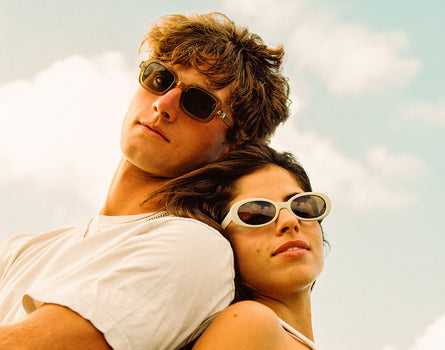 guy and girl wearing sunski bianca sunglasses