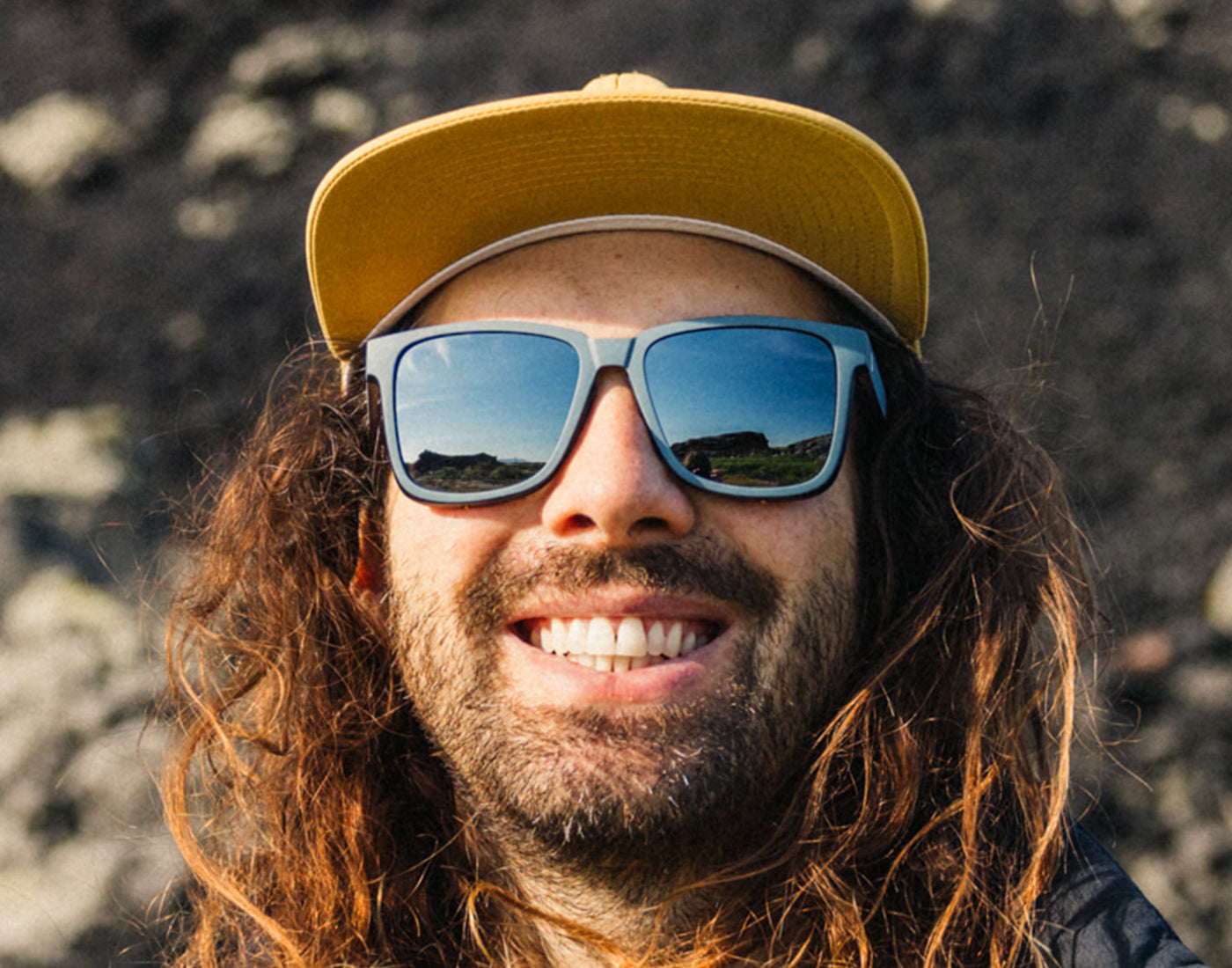 guy in sunski hat wearing sunski couloir sunglasses