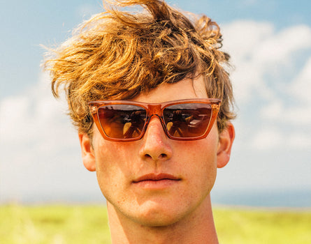 boy looking straight on wearing sunski fiorella sunglasses
