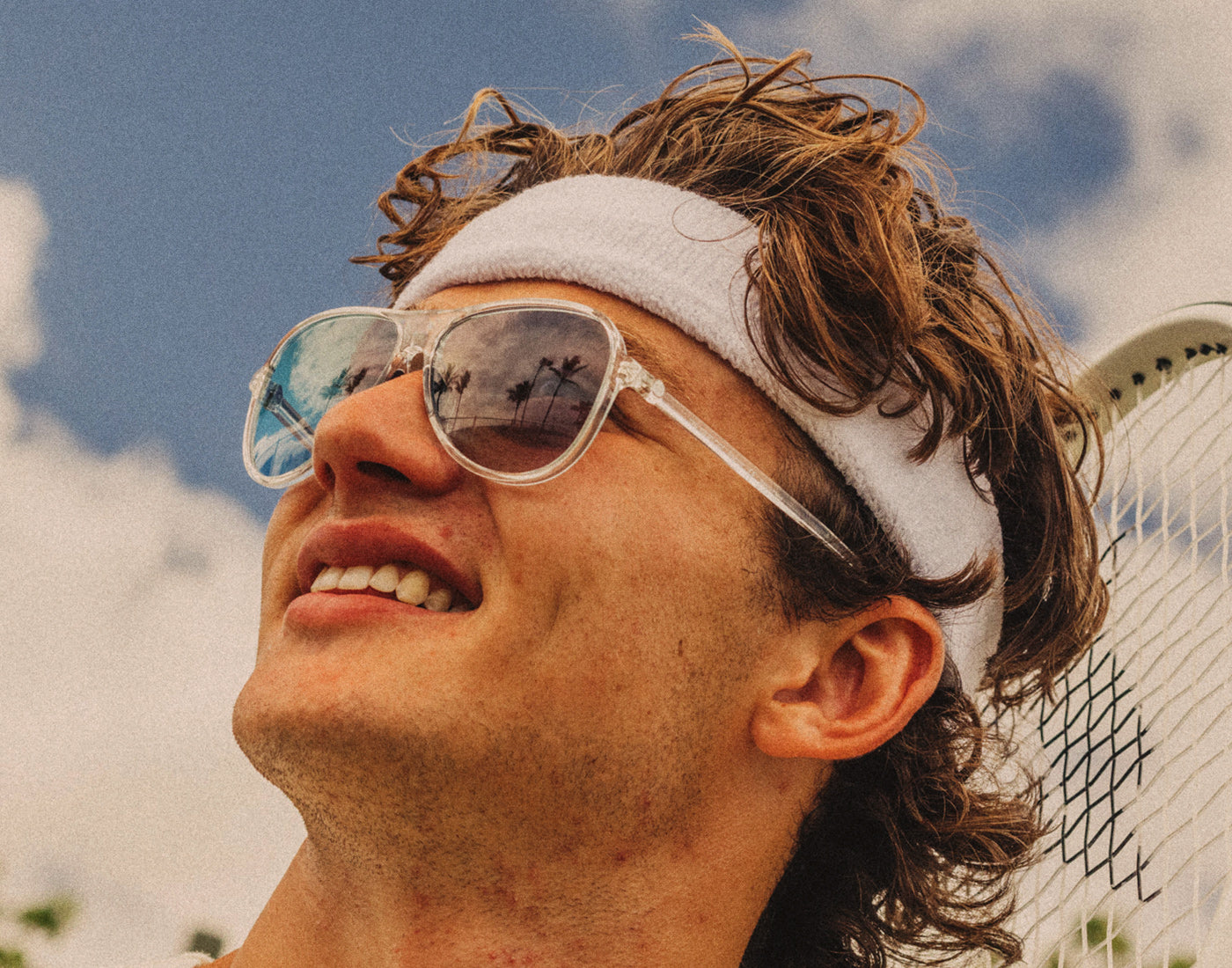 man looking at sky wearing sunski foxtrot sunglasses