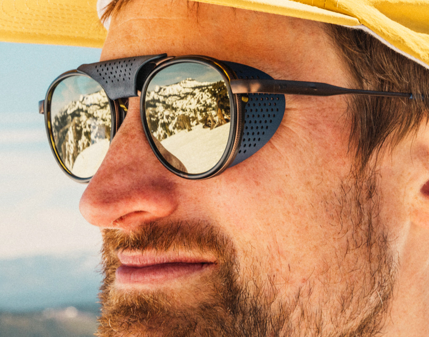 profile of guy wearing sunski strada sunglasses