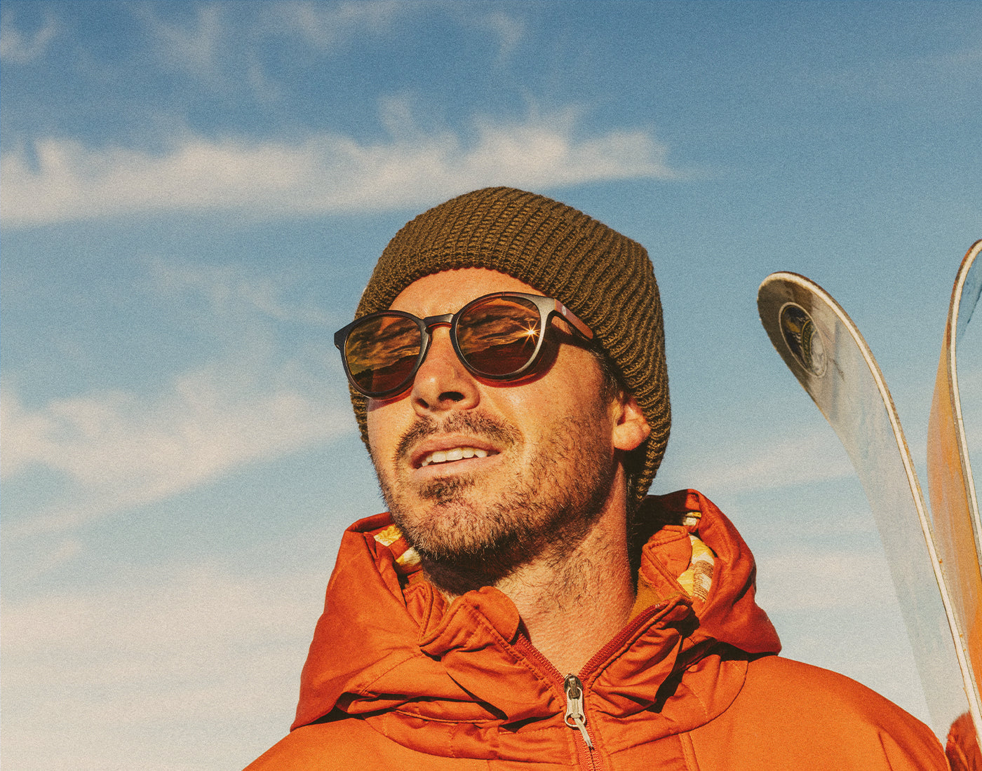 man looking into distance wearing sunski tera sunglasses