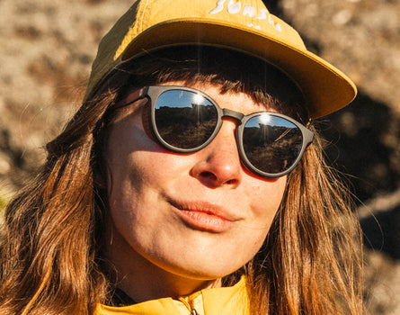 girl in sunski hat wearing sunski tera sunglasses